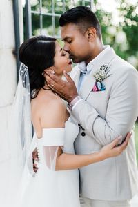 off the shoulder wedding dress and white groom attire tropical wedding ceremony #Weddings #Veils #Casamentos #Veus #Brides #Noivas