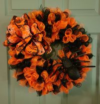 https://www.etsy.com/listing/1290513833/fun-halloween-wreath-with-big-spider-and