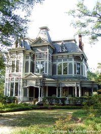 This is what I think White's Boarding House looks like. (This is a house in GA.) There aren't any trees around it though, and when I see it in my mind it is usually surrounded by snow.