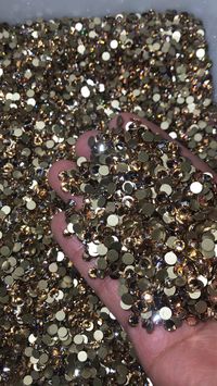 Color: Champagne Effect Material: Glass Shape: Round Type: Foiled/Glue-on Size: SS3-SS30 Cut Facets: Regular Cut Facets Back: Golden