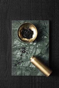 Zakkia SS 2015 - handmade green marble serving board and polished brass bottle and bowl
