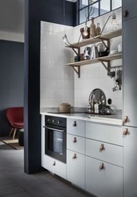Ambiance feutrée pour cet intérieur en bleu grisé