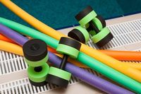 Swimming Pool Exercises Using an Aqua Noodle | Livestrong.com