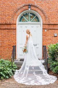 Colorful Summer Wedding Ideas | Northern Virginia Wedding Photographer | Emily & Jon's summer wedding in West Virginia was colorful and joyful. Their wedding color palette included peach, navy, mint green, oranges, and blues. They were married in a Catholic chapel and held their reception in a restored barn on the family farm in Martinsburg. Emily & Jon's bride and groom portraits absolutely glowed and are a classic example of timeless wedding photos.