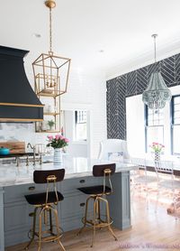 Classic black, white, and brass kitchen