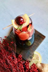 An easy sparkling red wine spritzer with lemon and ginger flavor topped off with cherry soda. #redwinedrink #redwinecocktail #redwinesritzerdrink