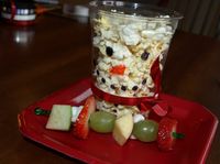 Snowman Popcorn Cups & Fruit Kabobs - great holiday classroom snack