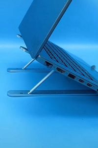 Nulaxy Laptop Stand is a laptop stand that is portable, adjustable, and can hold up to 44lbs. Use it in your dorm, at your desk, or wherever you need to get work done. #ad