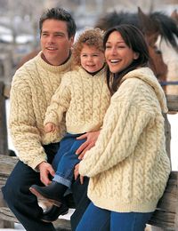 Free knitting pattern for Family Cable Sweaters - Here's one for the whole family from Patons! This aran cable pullover sweater comes with options for hood or crew neck and sizes for men, women and children 4-8 years old.