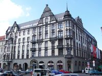 The luxury hotel opened in 1902 in an eclectic style of Art Nouveau and Gothic Revival architecture, It stand on the site of former Cafe Central opposite Katowice's Central Station. Used as offices during the communist regime and falling into disrepair after closure in the 1980s, the luxury hotel has been renovated at the beginning of the millennium.