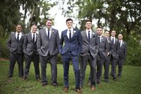 Outdoor Wedding Portrait of Groom in Navy Blue Suit and Groomsmen in Grey Suits | Tampa Bay Wedding Venue Cross Creek Ranch | Wedding Photographer Djamel Photography