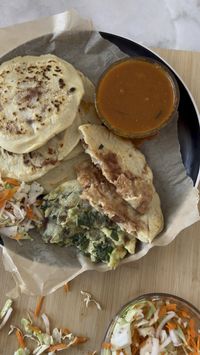 This pupusa recipe is a thick griddle cake made with corn flour and stuffed with a cheesy blend of goodness. The pupusas are served with Salvadoran staples such as salsa roja and curtido (spicy cabbage slaw). #pupusa #latinamericanrecipes #salvador #cheapmealsonabudget #beans