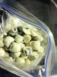 Blueberries covered in honey greek yogurt and frozen. Great healthy snack to have around when craving sweets.