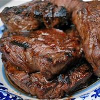 Steak Tip Marinade. This recipe sounds really tasty and easy. Make the marinade, put the steak tips in a crock pot pour in the marinade and cooked for 5 hours. The tips will fall apart and the marinade makes a great flavor. Could serve over egg noodles.