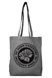 As the 2019 Tony Award winner for Best Original Score, Hadestown features compelling lyrics that you'll remember long after the curtain call. Keep some of those lyrics on hand everywhere you go with this stylish tote bag. Made of earthy gray fabric, it features lyrics from the song “Way Down Hadestown” and a black-and-white print of the iconic flower image.