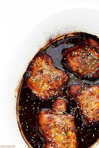 You'll love this easy crock pot recipe for chicken thighs cooked in honey garlic sauce. Only 5 ingredients a couple seasonings. Super easy chicken recipe! #crockpot #chicken #chickenthighs #chickendinner