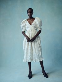 A fresh new take on a Naya Rea classic, the Valentina dress consists of 100% poplin cotton printed with a brand new hand made floral design for Spring 22, wrap front silhouette, ruched puff sleeves and a ruffle midi hem. Perfect paired with sandals on a sunny day, or boots and a light knit for a Spring evening.