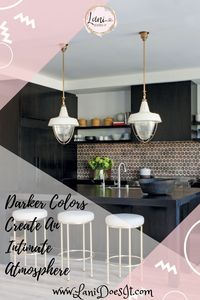 Darker kitchens create an intimate space. Balance it with lots of light.