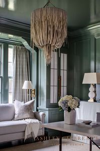 ASHLEY GILBREATH INTERIOR DESIGN: A funky, fun light fixture can add character to any space! We love how the leather texture of this light fixture softens the space and lines in this home office.