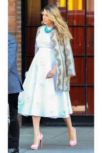 "Who says you can't wear white past Labor Day? Lively adds some spice to her muted look with a patterned coat, turquoise necklace, and pink platform heels." (On "8 Blake Lively Pregnancy Looks You NEED To Steal Right Now" via Refinery29)