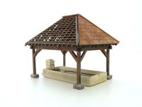 Lavoir avec bassin et fontaine typiquement Français à l'échelle 1 : 87 ème. Lavoir se composant d'un bassin, d'une fontaine et d'un abri en bois ultra-détaillé !