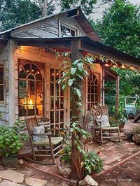 Love this. Big open windows. Simple little cabin like or she shed!