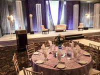 Grand Elegant Bling Wedding #lethbridgeeventrentals #lethbridgeevents #decor #purple #silver #bling #beads #chiavarichairs #beadedcolumns #stage #backdrop #entrance #grand #elegant