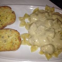 combine 3 diced chicken breasts, 1 cup of milk, 1 8oz brick of cream cheese, 2 packets of zesty Italian seasoning/dressing, & 2 cans of cream of chicken soup in a crock pot on high for 2+ hours (till chicken is cooked). serve over white rice or pasta with garlic bread. SO YUMMY!!!