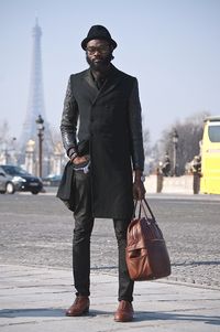 it drives me nuts when pinners don't identify... i can only guess that this is an alexander mcqueen or a burberry as they did similar multiple material coats like this... the construction of this is amazeballs.