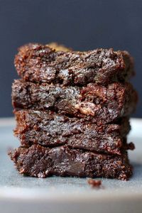 Gooey Vegan Tahini Brownies! These brownies are so easy to make and are absolutely delicious! Not to mention they are vegan, gluten free and fairly healthy. I'm definitely going to keep this recipe saved for a healthier dessert options for my kids! #vegan #vegetarian #glutenfree #brownies #brownierecipe #veganbrownies #glutenfreebrownies #tahini #tahinibrownies #easybrownierecipe #healthybrownies