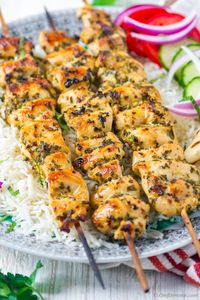 Chicken Souvlaki is Greek chicken kabobs marinated in fresh herb oregano (my fav), garlic, lemon, olive oil and seasonings. So simple, but amazingly flavorful chicken kabobs, Chicken Souvlaki is must try for every Mediterranean food lover! *Gluten free, carb-free, low-fat, paleo, and whole-30 diet friendly. #carbfreerecipes #lowfat #paleo #chickensouvlaki #chickengrilledrecipes #grilledchickenrecipes #summergrillingrecipes #chickenmarinaderecipes #grilledchickenrecipes #grilledchickenmarinade