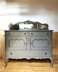 Vintage Lovely refinished this buffet using Grecian Clay! What a perfect neutral color that still makes a statement 🥰 www.wiseowlpaint.com #wiseowlpaint #painted #furniture #buffet #grecianclay