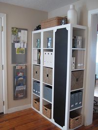 Isn't this clever? 3 bookcases from Ikea - one turned sideways & painted w/ chalkboard paint.
