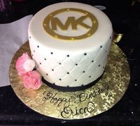 Micheal Kors logo cake