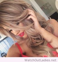 Gorgeous light brown hair with subtle blonde highlights.
