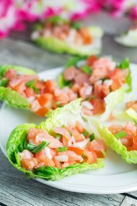 Lomi Lomi Salmon is a traditional Hawaiian side dish served at parties and gatherings. It requires only 4 ingredients and 10 minutes of your time! | cookingtheglobe.com