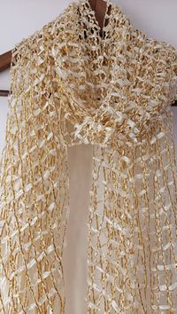 Check out this item in my Etsy shop https://www.etsy.com/listing/1394167297/gold-ribbon-scarfwedding-shawlbridal