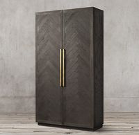 RH's Herringbone Double-Door Cabinet:Our collection's timeless pattern dates to the Roman Empire, where it informed the design of its brickwork roads, and later to France, where the first herringbone wood floor was laid in a 16th-century French chateau. Rich in textural details, our collection by Luay Al-Rawi features intricately hand-pieced oak herringbone set within precisely mitered frames and accented with sleek metal hardware.