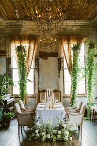 Lush English Garden inspired florals by Leaf + Petal NOLA add elegance to an intimate wedding reception at The Seraphim House in New Orleans. Candlesticks by House of Modern Vintage NOLA