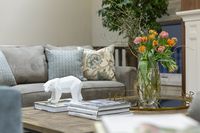 This was the homeowners’ third custom home so they had a strong vision from the beginning of what they wanted. The house is surrounded by trees close to the water so the clients requested a "cozy cottage" feel that still appeared polished and provided functionality for everyday living and entertaining.