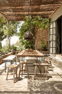 hotel-La-Granja-ibiza-outdoor-dining-terrace-steel-windows-doors-gardenista                                                                                                                                                     Mais