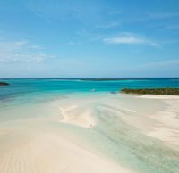 Ocean blues so extraordinary they are even visible from space... Immerse yourself in a spectrum of hues that is nothing short of magical at Sandals Emerald Bay. Photography: Conor McCann