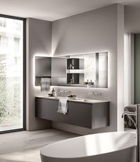 The simplicity of this offering highlights the ultra-trendy details: a new system of mirrors and Magneto accessories affording the utmost versatility. Open-fronted wall units also available with mirror wall panels, shelves, soap dishes, tumbler-holders and towel rails that are magnetic and can be positioned freely across the surface of the mirror.