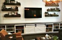 Shiplap, floating shelves, built-in with sliding barn doors, what else can you ask for? All custom made from Flippin' Rustic