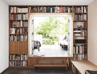 book shelves framing window/terrace door