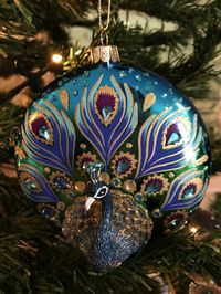 Peacock Ornaments Decorate Christmas Tree - Debbee's Buzz