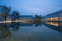 Inspired by Wuzhen’s picturesque maze of quiet canals and ancient alleyways, Alila Wuzhen offers an extraordinarily peaceful escape for exploring the town’s rich cultural heritage of Ming and Qing era architecture. Designed around water features and stone walkways, the 125 suites and villas are stylishly simple, with private courtyards, light wood–paneled walls, and sleek furnishings (some villas come with their own pool).