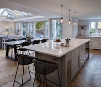 Westbury Garden Rooms removed the existing snug wall to make a new entrance to the utility room. We also created a big structural opening for the Humphrey Munson kitchen to make one large, multi-functional space.