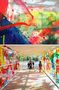 Children paint plexiglass and make an outdoor exhibit for them to walk through. Viachroma by Rowena Martinich: Pedestrians are enveloped in colored lights and shadows as sunlight passes throught at different times of day.