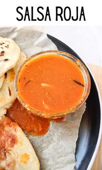 This recipe for salsa roja is an easy and delicious condiment that can be added to pupusas, tacos, or used as a dip. It can be made as mild or as spicy as you like too! #salsa #salsaroja #pupusas #latinfood #tacos